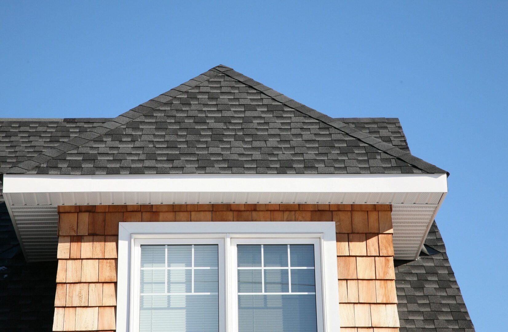 A house with a roof that has been angled to make it look like a triangle.