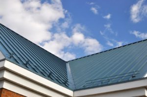 A blue metal roof on top of a building.